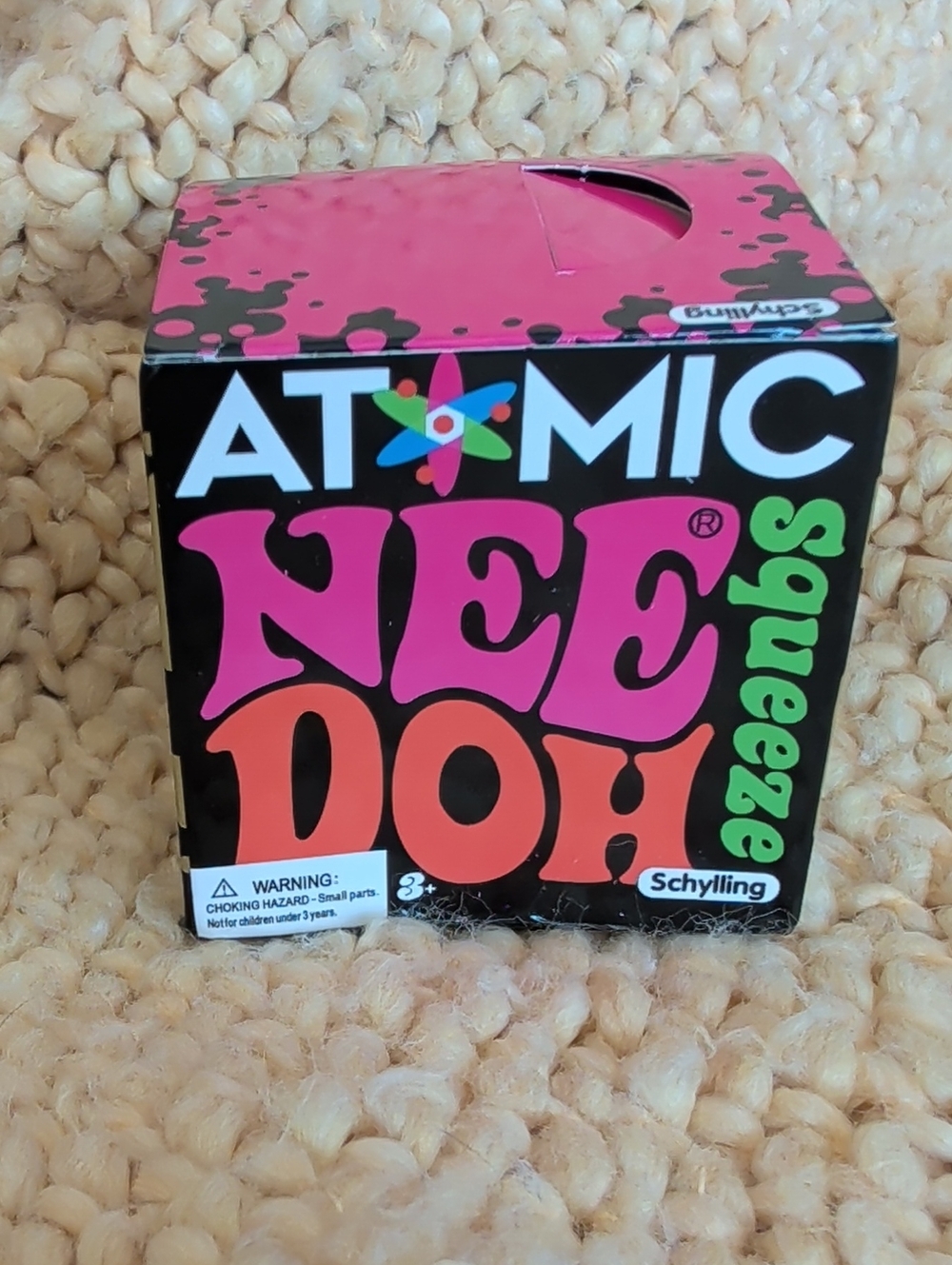 Atomic NeeDoh Squeeze Toy - White Ball With Blue Speckles
